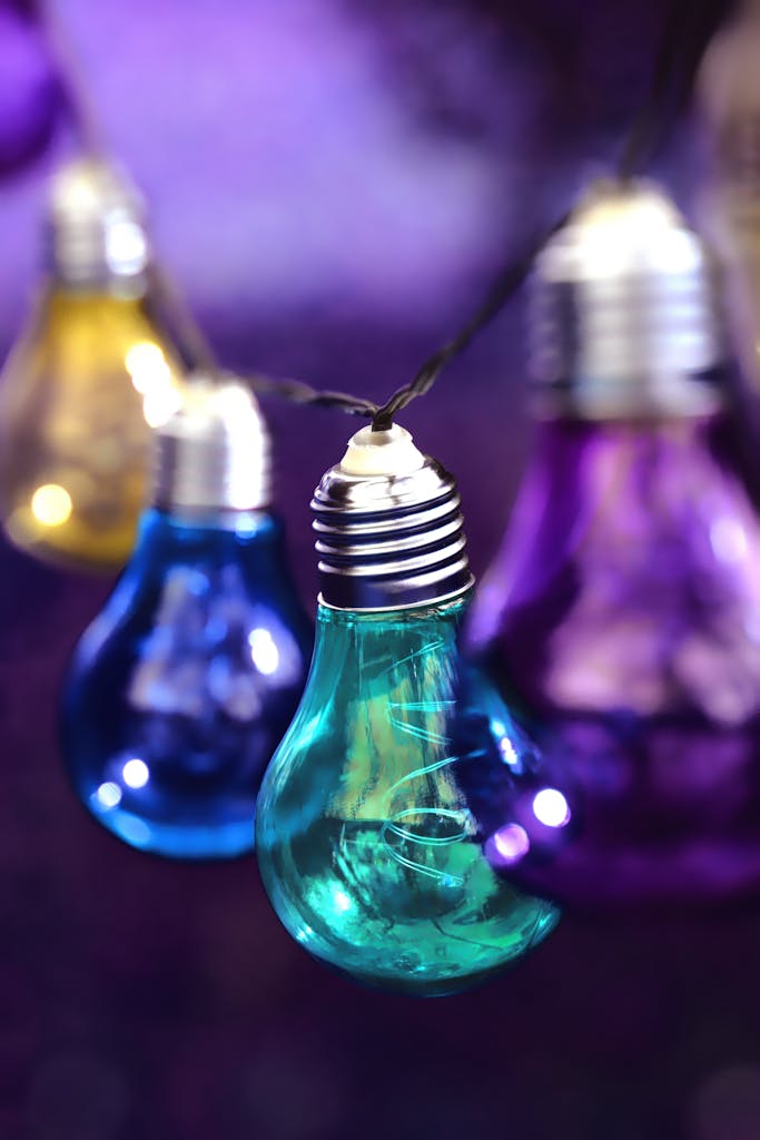 Photo by Alexas Fotos solar power Vibrant multi-colored light bulbs hanging as festive decoration.